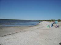 Sunbathing with Warm, blue waters and fine white sand|Hillside Beach Manitoba Canada